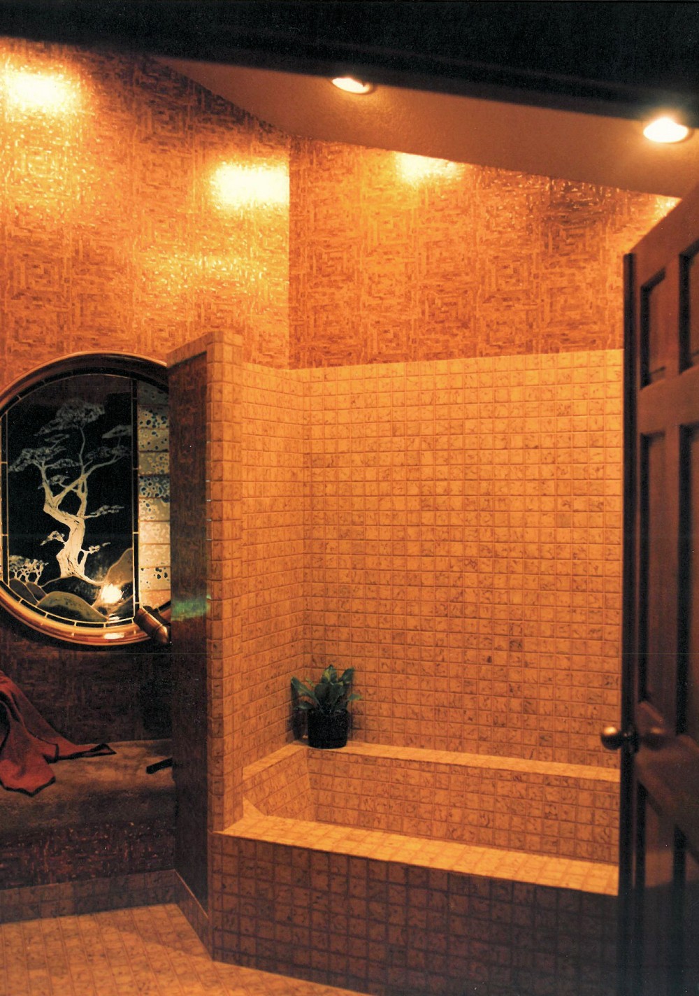 1980 Excelsior - tiled bathroom with round window - custom home by Rick Bernard Custom Homes.