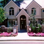Oregon Fir 2001 front entrance landscape - Street of Dreams custom home by Rick Bernard Custom Homes.