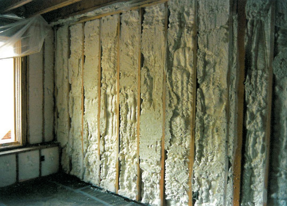 Construction phase - blow in batt plus spray cellular foam insulaton custom homes by Rick Bernard.